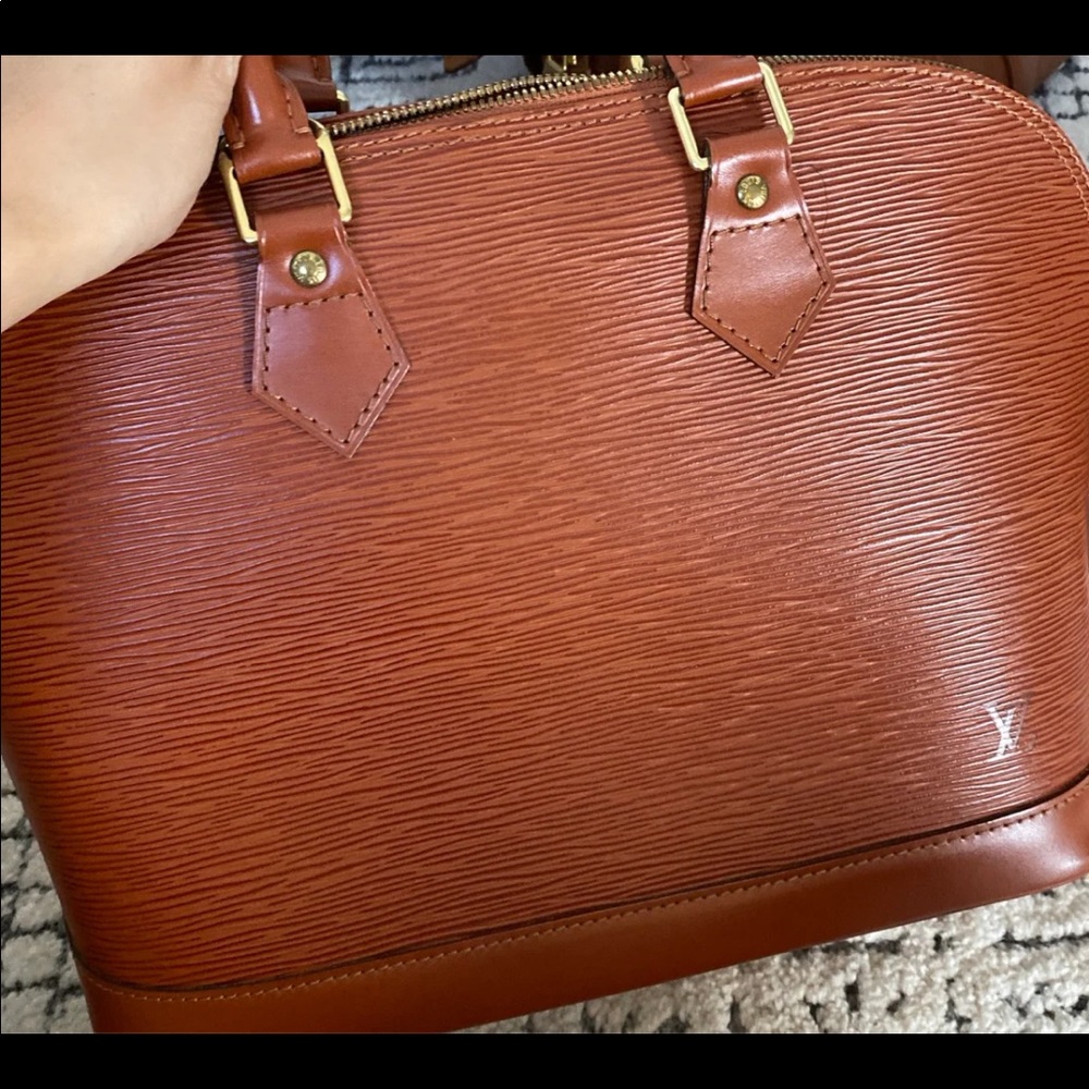 Louis Vuitton Alma PM EPI bag